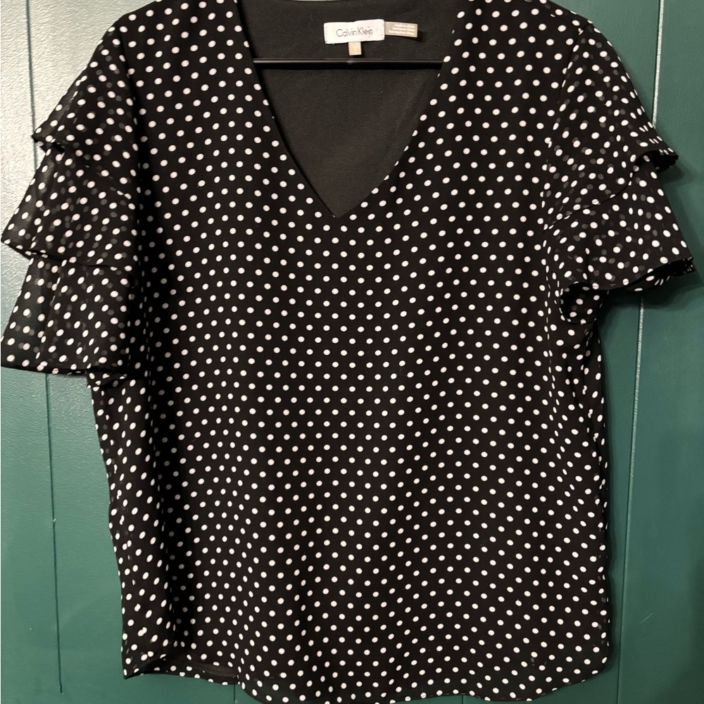 Women’s Calvin Klein blouse
Size M